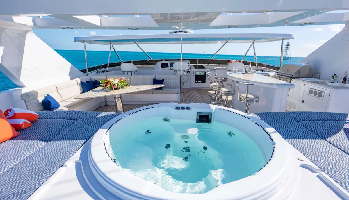 Jacuzzi on the sundeck of Reflections Motor Yacht with ocean views.