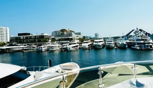 Las Olas Marina filled with luxury yachts under a clear blue sky