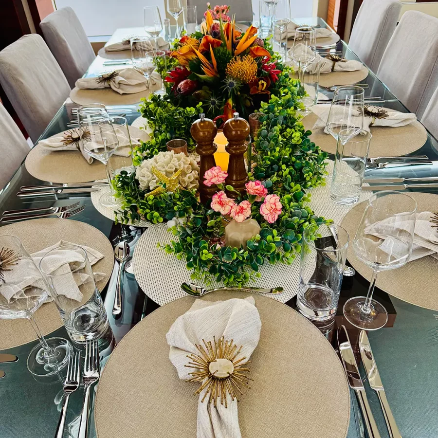 Elegant dining table setup onboard Allora motor yacht
