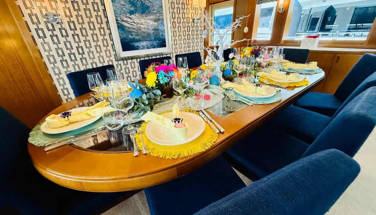 Easter-themed table decor with bunny napkins and florals