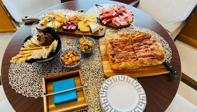 Gourmet charcuterie and focaccia bread on a table