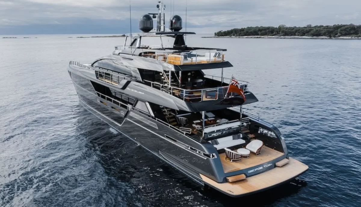 Full view of Lady First luxury yacht from aft angle at sea