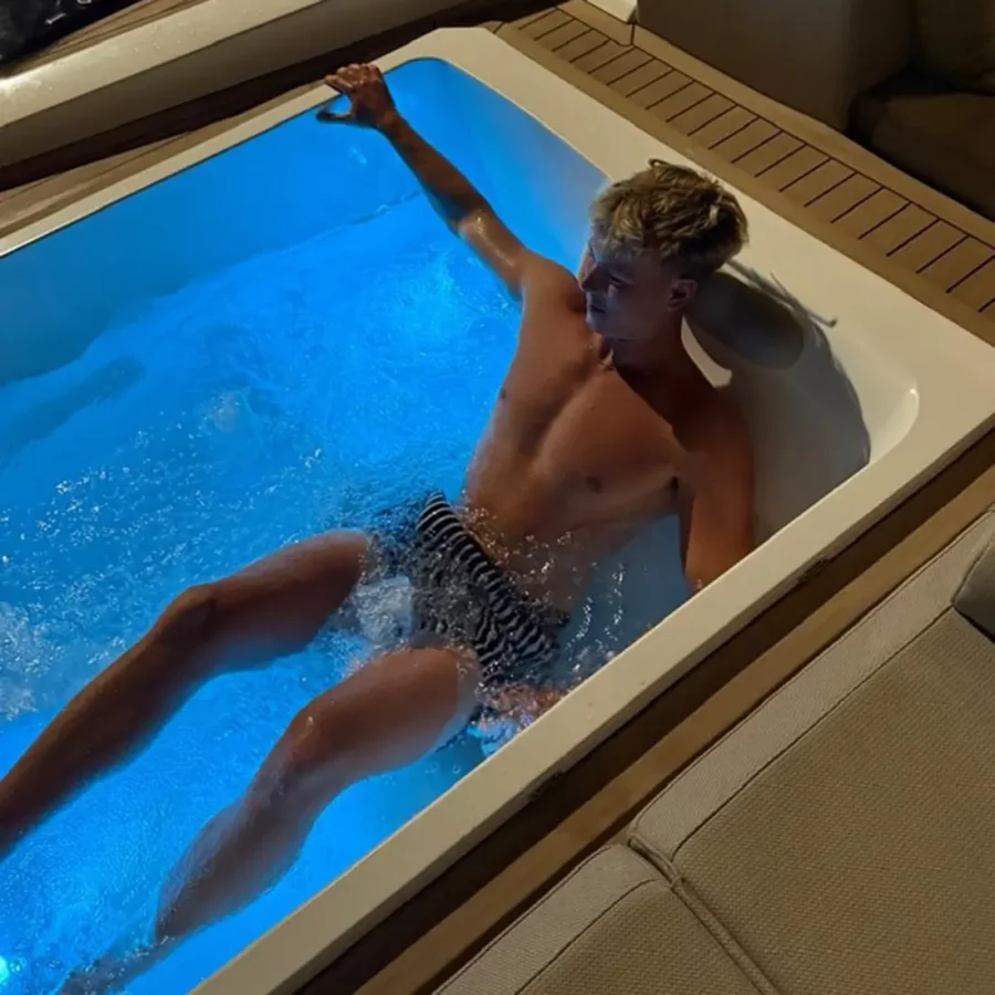 Guest relaxing in Ad Astra FP 80’s illuminated Jacuzzi